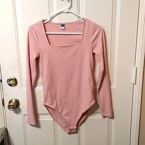 Light pink body suit